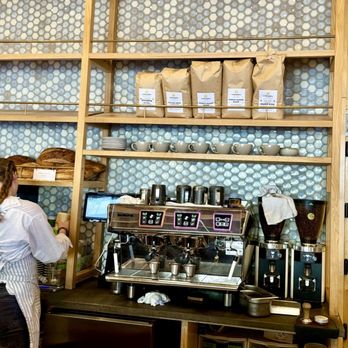 Perenn - Midtown - Barista, gorgeous backdrop behind counter. - Bakeries Near Me - Reno, Nevada
