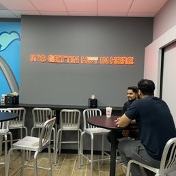 Tables with chairs and bar seating. Tables with chairs and bar seating.