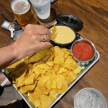 Fairway Social Alpharetta - a tray of nachos and beer - Golf Near Me - Alpharetta, Georgia Fairway Social Alpharetta - a tray of nachos and beer - Golf Near Me - Alpharetta, Georgia