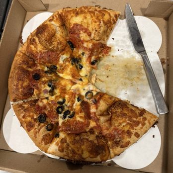 Chattanooga Pizza Co - This is the Big Torino with xtra cheese, pepperoni and olives. $34.00 and it's all crust. Left the knife in to show how small. - Pizza Near Me - Chattanooga, Tennessee Chattanooga Pizza Co - This is the Big Torino with xtra cheese, pepperoni and olives. $34.00 and it's all crust. Left the knife in to show how small. - Pizza Near Me - Chattanooga, Tennessee