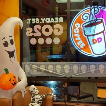 Dunkin' -  a ghost sitting in a chair in front of a dunkin donut shop - Coffee & Tea Near Me - Shawnee, Kansas