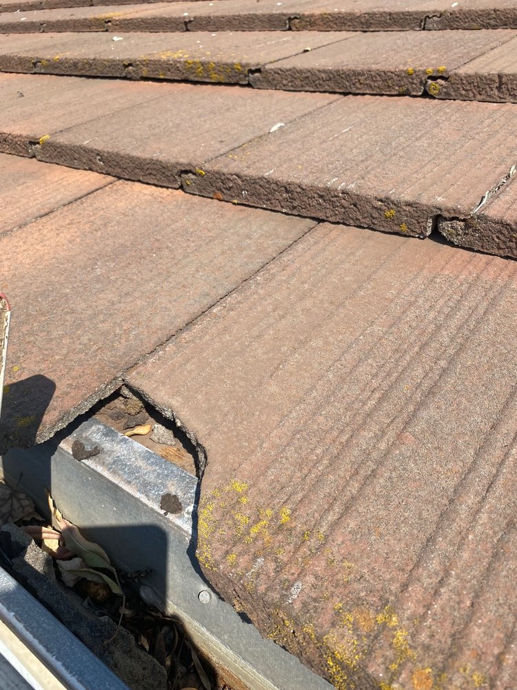 Slide of oscar Roofing