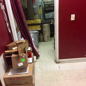 Asian Wok Chinese Restaurant - Egg rolls thawing next to water heater. Note the bleach bottle overhead - Chinese Near Me - Star, Idaho Asian Wok Chinese Restaurant - Egg rolls thawing next to water heater. Note the bleach bottle overhead - Chinese Near Me - Star, Idaho