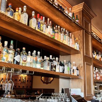 Frankie’s - a row of liquor bottles on shelves - Cocktail Bars Near Me - Oceanside, California Frankie’s - a row of liquor bottles on shelves - Cocktail Bars Near Me - Oceanside, California