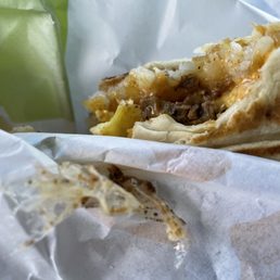 The plastic I found inside the crunch wrap I ordered. The plastic I found inside the crunch wrap I ordered.