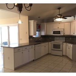 Stone Creek Woodworking - Shaker style beaded door kitchen with granite top and 4" crown