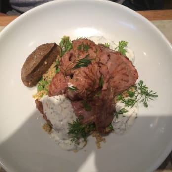 Le Verre Volé - Lamb on a bed of bulgur and green peas, with yogurt-mint sauce (all great), and a spoon of eggplant caviar on the left (bad) - Wine Bars Near Me - Paris, 75 Le Verre Volé - Lamb on a bed of bulgur and green peas, with yogurt-mint sauce (all great), and a spoon of eggplant caviar on the left (bad) - Wine Bars Near Me - Paris, 75