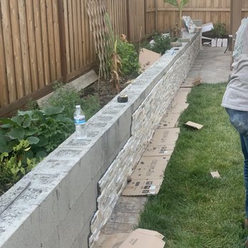 The Lawn Guys - Retaining wall being built with nice details - Lawn Services Near Me The Lawn Guys - Retaining wall being built with nice details - Lawn Services Near Me