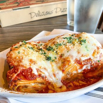 Vivace Express - a plate of lasagna and a glass of water - Pizza Near Me - Pompano Beach, Florida Vivace Express - a plate of lasagna and a glass of water - Pizza Near Me - Pompano Beach, Florida