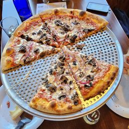 Classic cheese pizza with mushrooms and onions