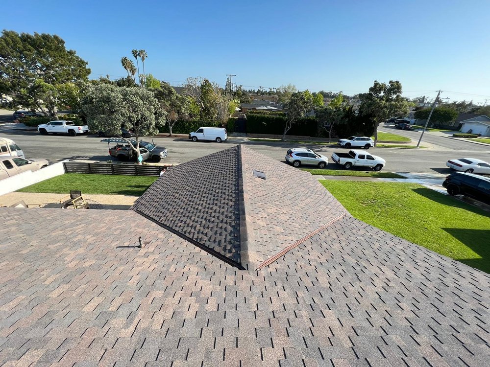 Slide of iHeart Roofing