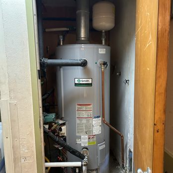 Plumb Quick Company - Water heater installed in closet - Plumbing Near Me - Plano, Texas Plumb Quick Company - Water heater installed in closet - Plumbing Near Me - Plano, Texas