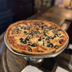 Nanuet Hotel & Restaurant - Onion and olives thin crust pizza