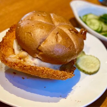 Bavarian Bierhaus - Black Forest Chicken Schnitzel sandwich with cucumber salad. - German Near Me - Glendale, Wisconsin