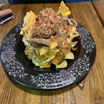 KOW Restaurant - Pork nacho!! Super cool , comes with a Tin can and the waiter removed leaving the nachos as above ! - Comfort Food Near Me - Miami, Florida