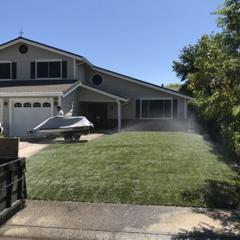 Excellent landscaping - a house with a boat in the yard - Landscaping Near Me - Roseville, California