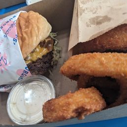 Cheeseburger with onion rings. Cheeseburger with onion rings.