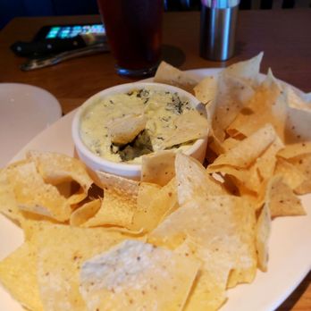 BJ's Restaurant & Brewhouse - Spinach Artichoke Dip - New American Near Me - Mentor, Ohio BJ's Restaurant & Brewhouse - Spinach Artichoke Dip - New American Near Me - Mentor, Ohio