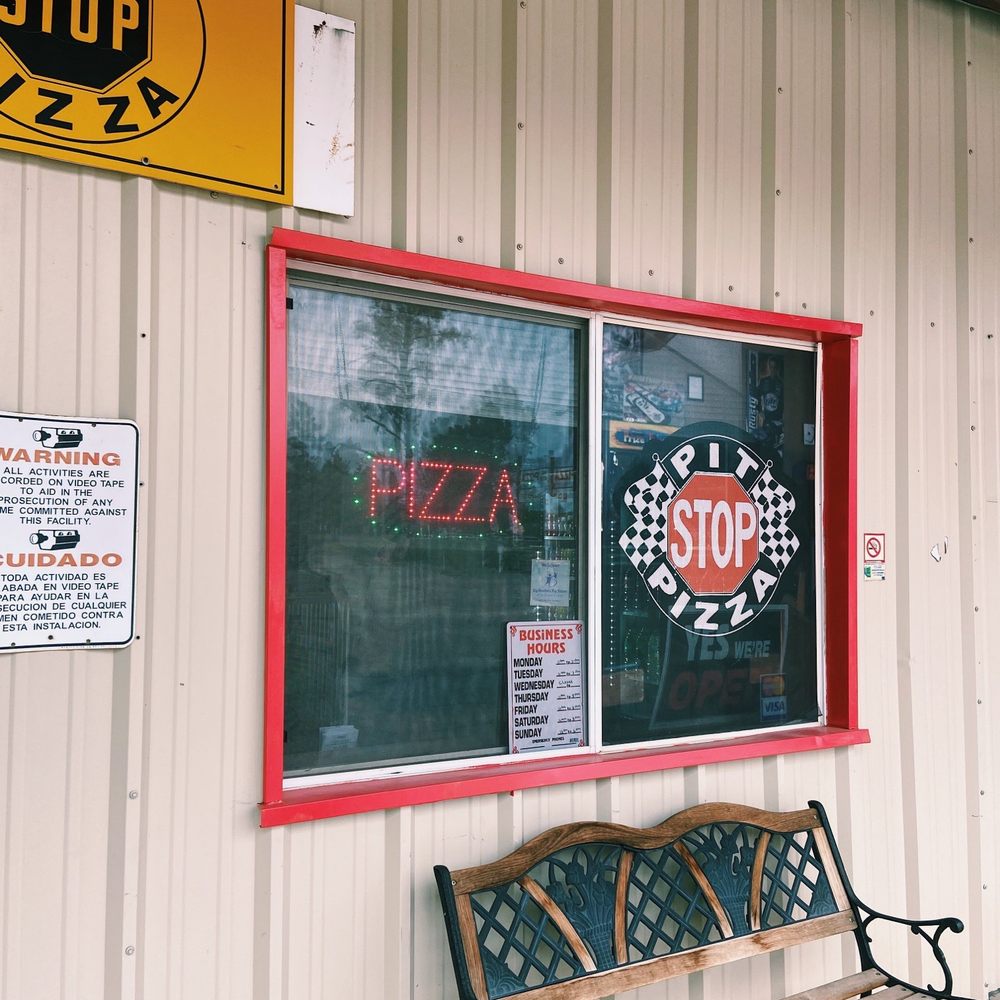 Pit Stop Pizza - a bench outside a restaurant - Pizza Near Me - Overgaard, Arizona Pit Stop Pizza - a bench outside a restaurant - Pizza Near Me - Overgaard, Arizona