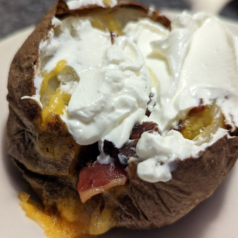 Cherry Hill Hotel - Loaded baked potato - Seafood Near Me - Nazareth, Pennsylvania Cherry Hill Hotel - Loaded baked potato - Seafood Near Me - Nazareth, Pennsylvania