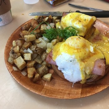 My Cafe - Eggs Benedict served on sourdough bread with perfectly prepared poached eggs and ham. The seasoned potatoes are worth a plate by themselves. - Breakfast & Brunch Near Me - Kapolei, Hawaii My Cafe - Eggs Benedict served on sourdough bread with perfectly prepared poached eggs and ham. The seasoned potatoes are worth a plate by themselves. - Breakfast & Brunch Near Me - Kapolei, Hawaii