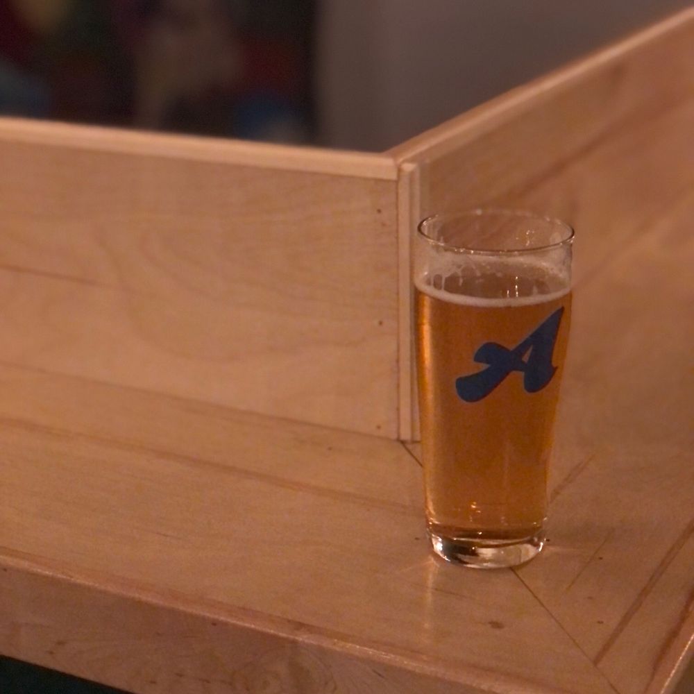 Arcadia Bar - a glass of beer on a bar - Brewpubs Near Me - Edmonton, Alberta