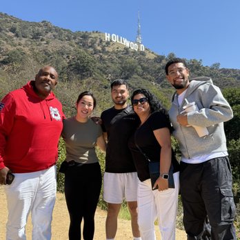 Guideline Tours - This group is loving the Hollywood side and the views of the city below - Tours Near Me - Los Angeles, California Guideline Tours - This group is loving the Hollywood side and the views of the city below - Tours Near Me - Los Angeles, California