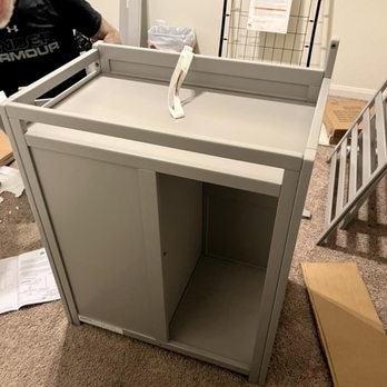 Ol'e Country Construction Remodeling - a man working on a cabinet - General Contractors Near Me Ol'e Country Construction Remodeling - a man working on a cabinet - General Contractors Near Me