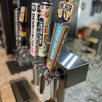 Hillside Tavern - a row of beer taps on a bar - American Near Me - San Rafael, California Hillside Tavern - a row of beer taps on a bar - American Near Me - San Rafael, California