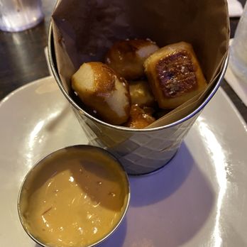 Social House Kitchen and Bar - Pretzel bites with cheese sauce - Burgers Near Me - Bakersfield, California Social House Kitchen and Bar - Pretzel bites with cheese sauce - Burgers Near Me - Bakersfield, California