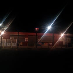 Cracker Barrel Grocery - Store front, dark night