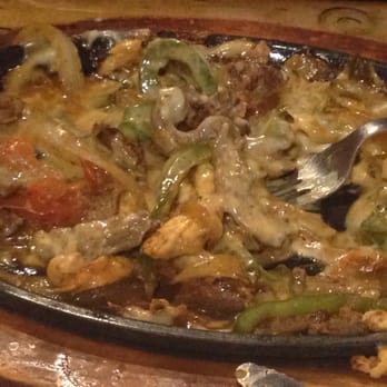 Real Hacienda - Chicken and steak fajita smothered in cheese - Mexican Near Me - Terre Haute, Indiana Real Hacienda - Chicken and steak fajita smothered in cheese - Mexican Near Me - Terre Haute, Indiana