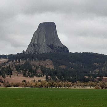 Mercantile 307 - a view of a mountain with a green field in front of it - Farmers Market Near Me - Hulett, Wyoming Mercantile 307 - a view of a mountain with a green field in front of it - Farmers Market Near Me - Hulett, Wyoming