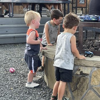 The Yard - My grandson, the little blonde, making new friends! - Sports Bars Near Me - McKinney, Texas