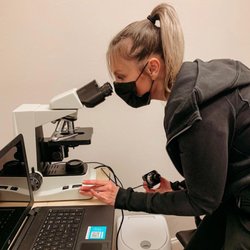 Regen Wellness - We do microscopies, too! Our veteran Microscopist Brittany examines your cellular & blood health on a microscope while you watch on a screen