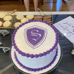 J Clayborn's Bakery & Cafe - Hand decorated graduation cake. Unbelievable piping work.