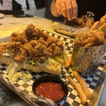 Cajun Flames - shrimp poboy + truffle fries - Seafood Near Me - New Orleans, Louisiana