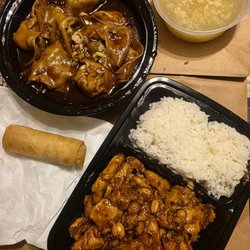Panda Garden - Szechuan Dumplings top left, small side of egg drop soup in top right, veggie egg roll, & Kung pao chicken w/steamed rice, $24 before tip.