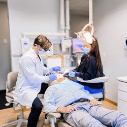 MI Smiles Dental Cascade - Our team provides personalized dental care in a comfortable treatment room.