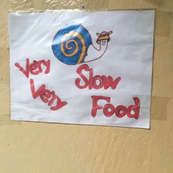 Comida Thai - They warn you about wait times when restaurant is full, there are six of these cute posters plastered inside.