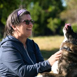 Charles Le Photography - Buddy's Way K9®'s Sybl A Saisselin enjoying a moment with Service Dog graduate, Yue. BuddysWayK9.com