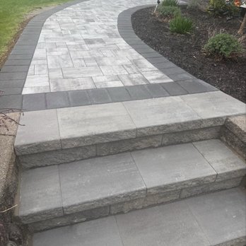 Opulent Surfaces - The pavers at my aunts house with the stairs they built. - General Contractors Near Me - Passaic, New Jersey