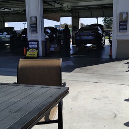 Exterior outside entrance of Jiffy Lube Oil Change - Car is getting serviced. - Garden Grove, California Exterior outside entrance of Jiffy Lube Oil Change - Car is getting serviced. - Garden Grove, California
