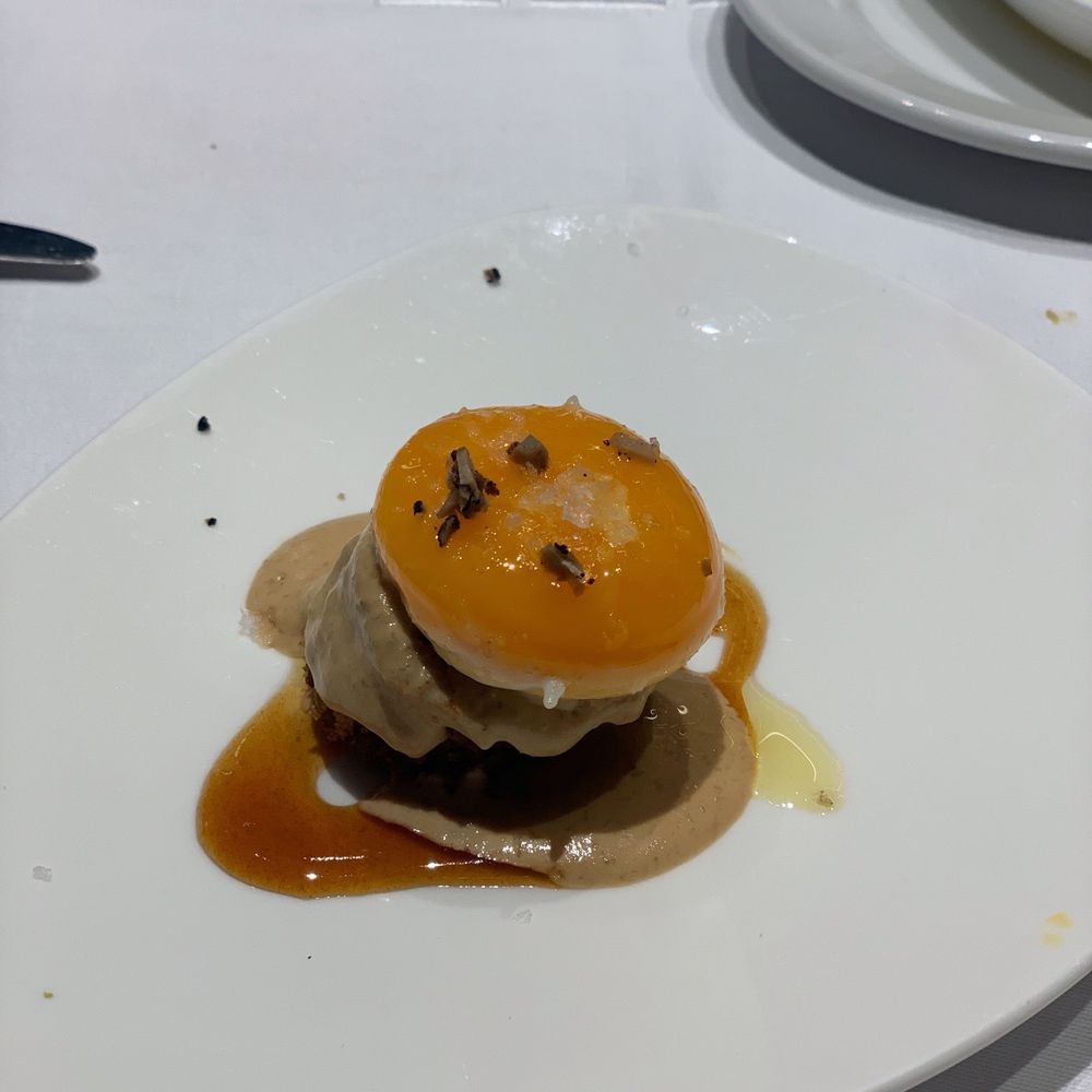 Eslava - egg over cake w/ mushroom cream sauce - Tapas Bars Near Me - Seville, SE Eslava - egg over cake w/ mushroom cream sauce - Tapas Bars Near Me - Seville, SE