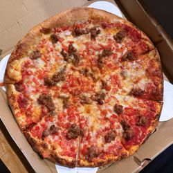 Bruno’s 6th Street Market - 14 inch pizza with tomato and sausage  - Bruno's Pizza - Bend Oregon