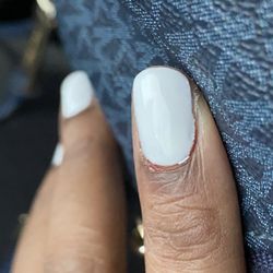 Nice Nails - My index and middle finger were bleeding, and my tech painted over it.