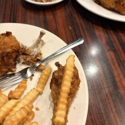 Emil's Famous Broasted Chicken. Look at the size of the piece!! Ridiculous. Fry is larger than the leg.