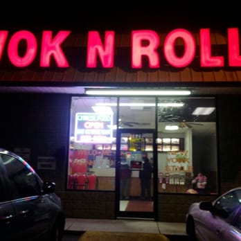 Wok & Roll - a neon sign for a restaurant - Chinese Near Me - Knoxville, Tennessee Wok & Roll - a neon sign for a restaurant - Chinese Near Me - Knoxville, Tennessee