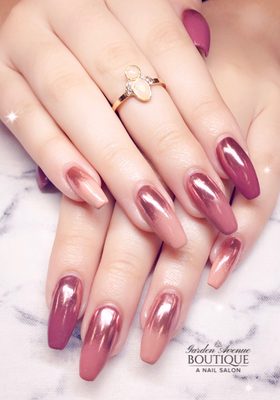 Gel Nail Services! - At Garden Avenue Boutique, we specialize in providing exquisite Gel Nail Manicures, a perfect blend of lasting beauty and nail health. Our Gel Nail Manicure service is crafted to not only give your nails a stunning, glossy finish but also to ensure they remain strong and healthy.

Our expertly trained technicians begin the process with a meticulous nail preparation, ensuring your nails are clean, shaped, and ready for the gel application. We then apply a high-quality gel polish, chosen from a wide array of vibrant colors from our exclusive GAB polish collection. This polish is not only gorgeous but also durable, providing a chip-resistant, long-lasting wear that maintains its high-gloss finish for weeks.

The application involves curing under a UV or LED lamp, ensuring the gel adheres perfectly and dries instantly for a flawless finish. We pay close attention to detail, ensuring every inch of your nail is perfectly covered and the cuticles are neat and tidy.

One of the main advantages of our Gel Nail Manicure is the minimal drying time, allowing you to go about your day immediately after the service without worrying about smudges or chips. Additionally, our gel polishes are formulated to be gentle on your nails, promoting their strength and health.

To conclude your manicure, we offer a hydrating cuticle oil treatment and a gentle hand massage, leaving your hands feeling as good as they look. At Garden Avenue Boutique, our Gel Nail Manicure is more than just a beauty treatment; it's an experience that leaves you with beautifully manicured, healthy nails that stand out in both quality and style.