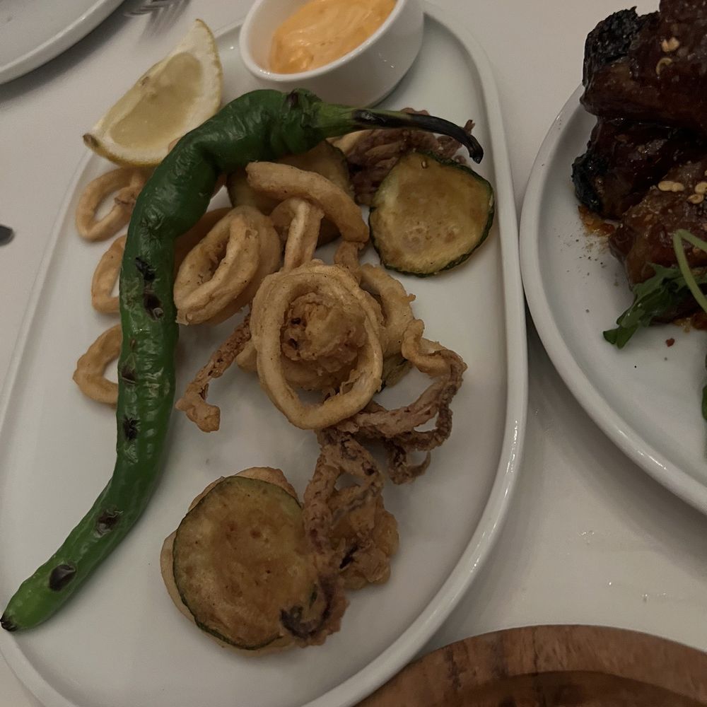 Calamari, sticky ribs, pork belly, pear martini, cheese wheel pasta
